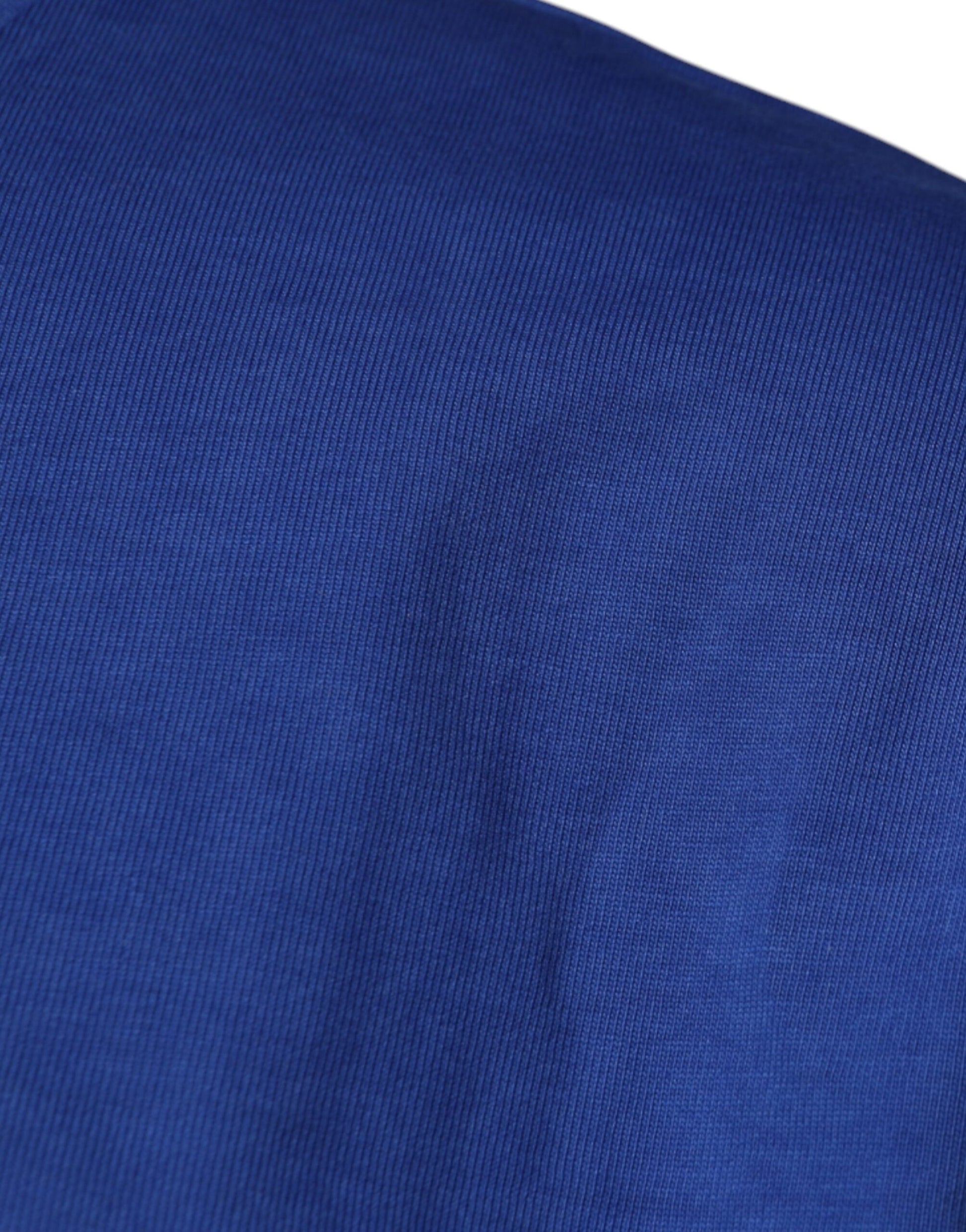 Blue fabric with a slight stain on it