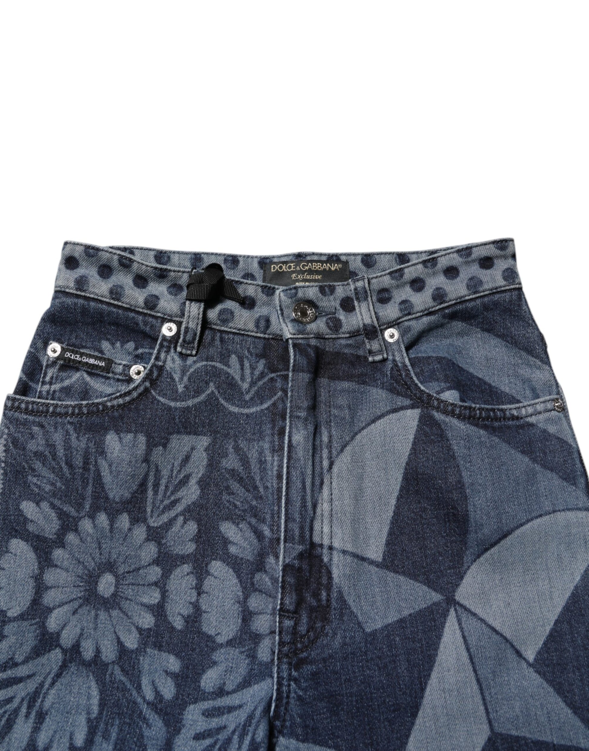 Blue denim shorts with floral pattern on front