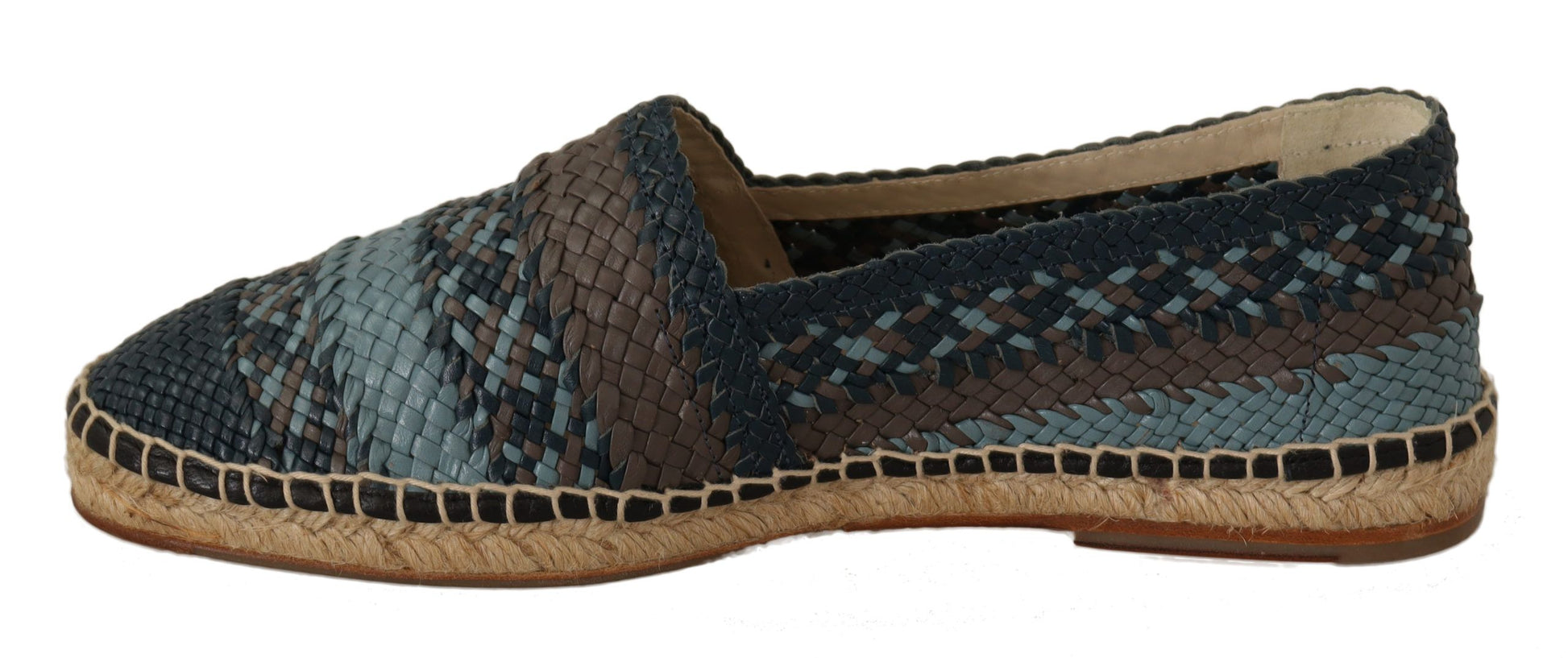 Pair of women's shoes with a snake skin design and wedge heels