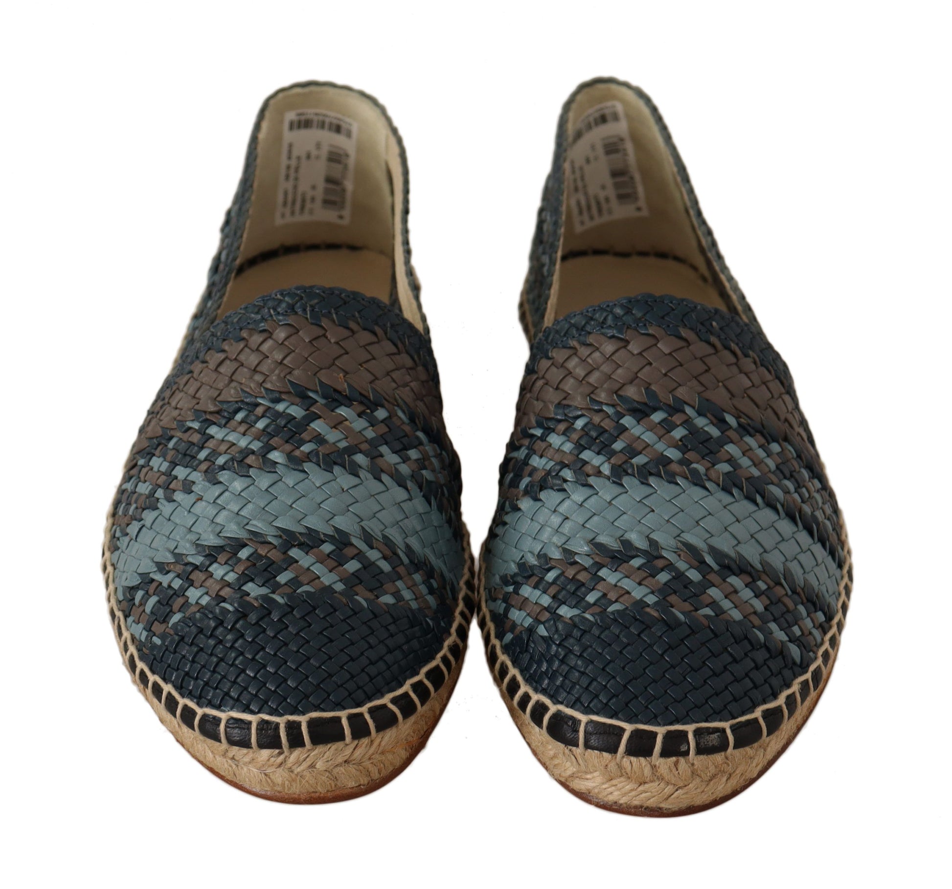 Pair of blue and brown woven shoes with tan soles