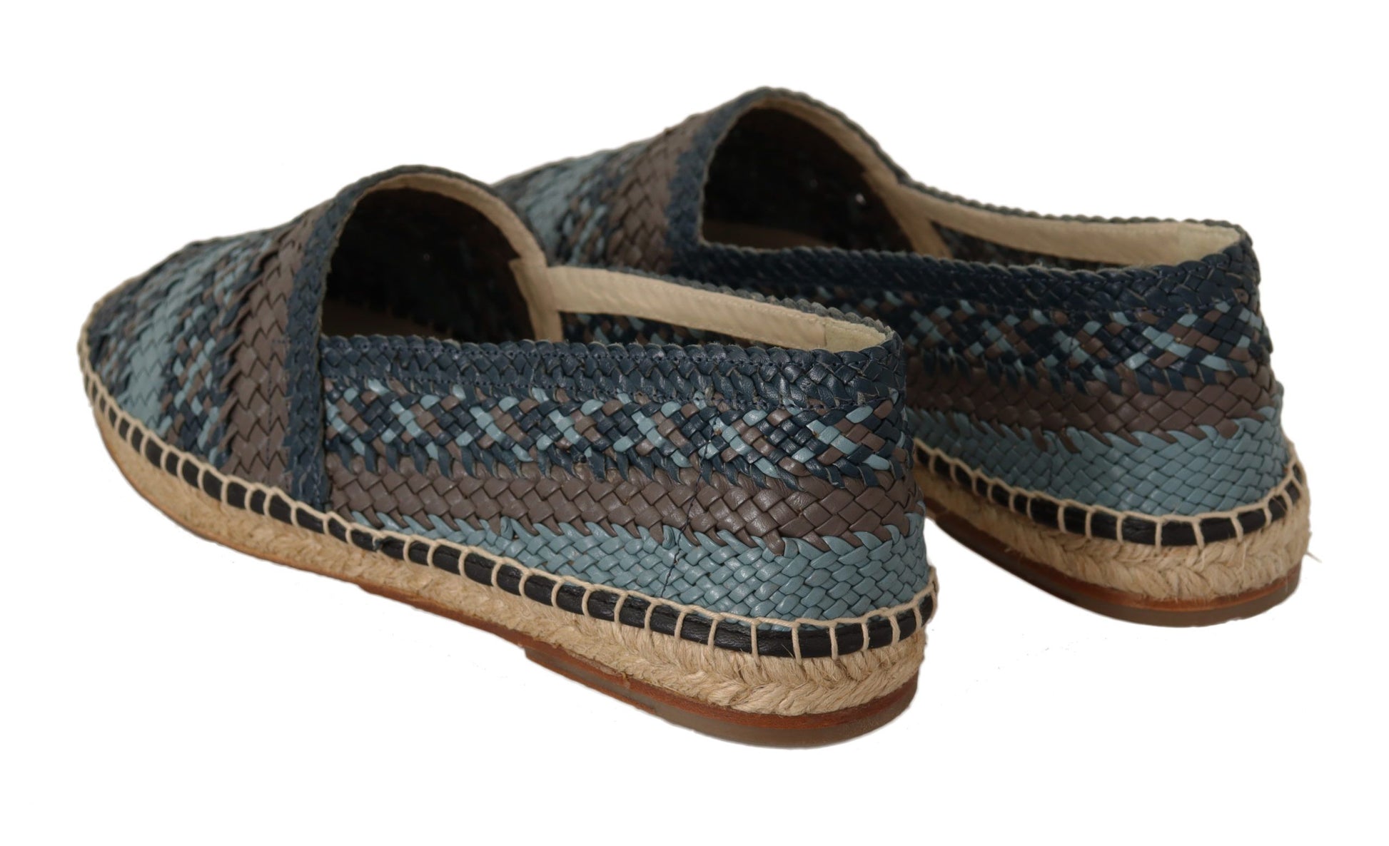 Pair of blue and brown woven sandals with beige soles