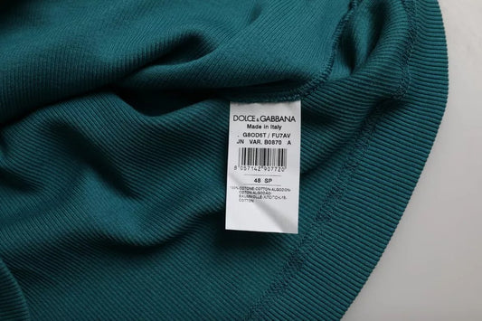 Green fabric with tag on neckline
