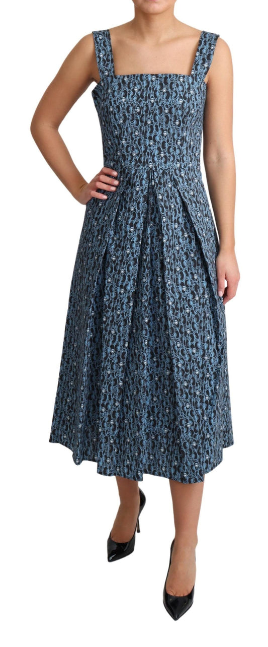 A blue dress with a heart pattern, designed by Dolce & Gabbana. It is an A-line stretch dress that features a