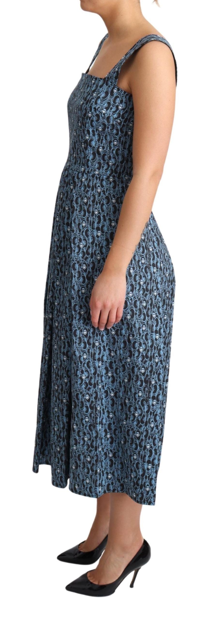 A blue heart patterned dress with an A-line silhouette, designed by Dolce & Gabbana. It is made of cotton and