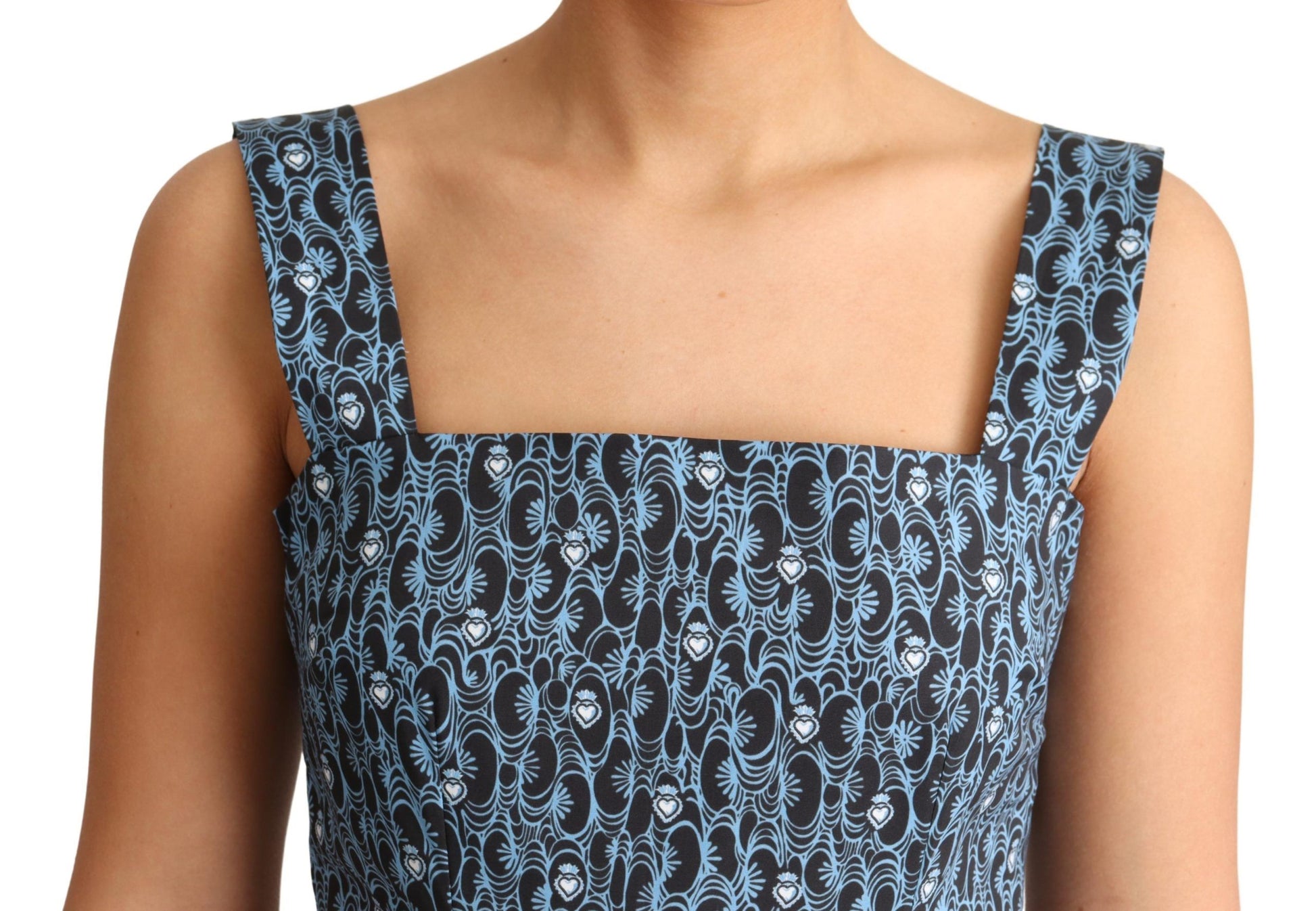 A blue heart patterned cotton dress with a stretchy waist and sleeves, designed by Dolce & Gabbana