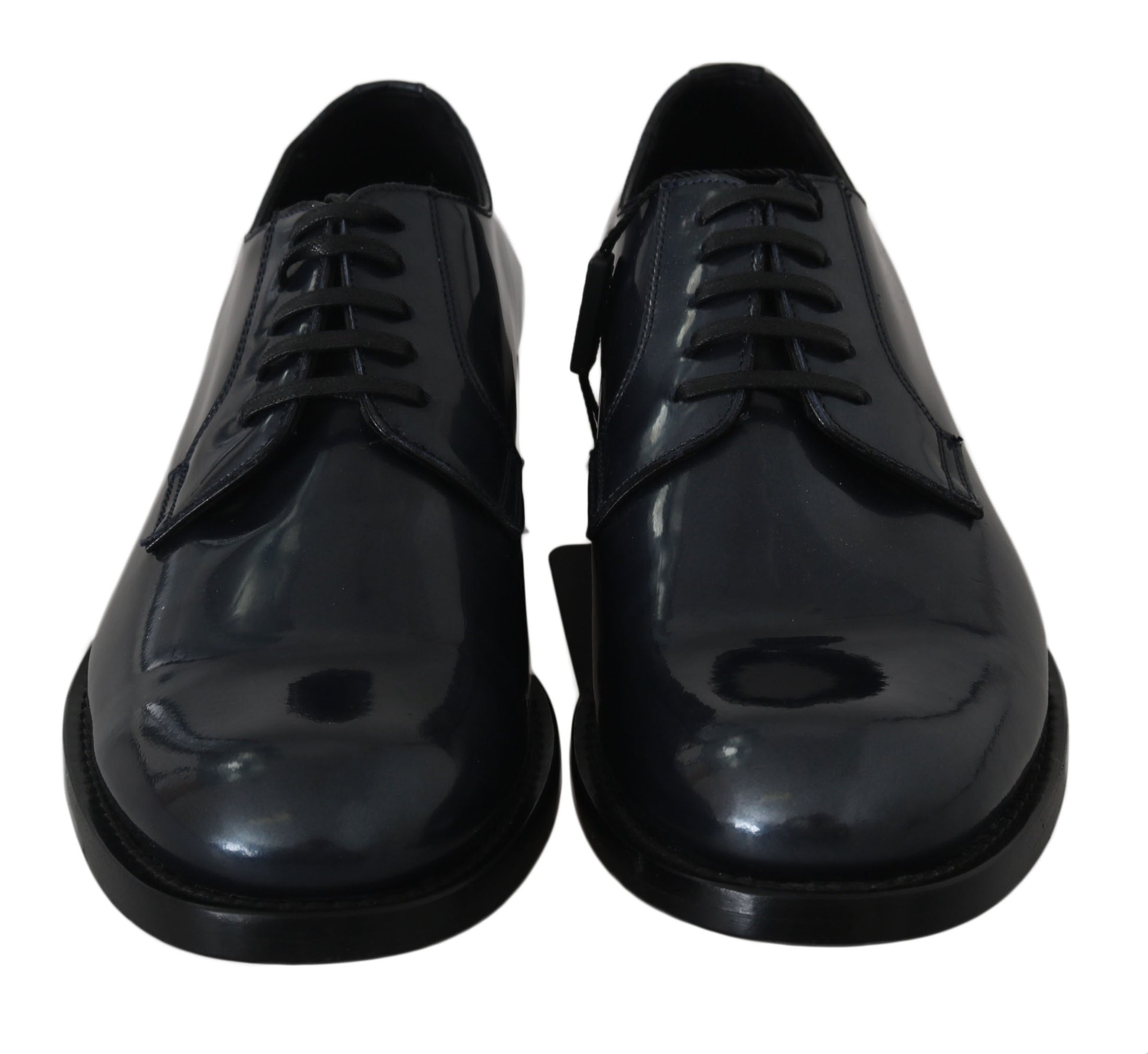 Pair of black leather dress shoes with laces and a small heel