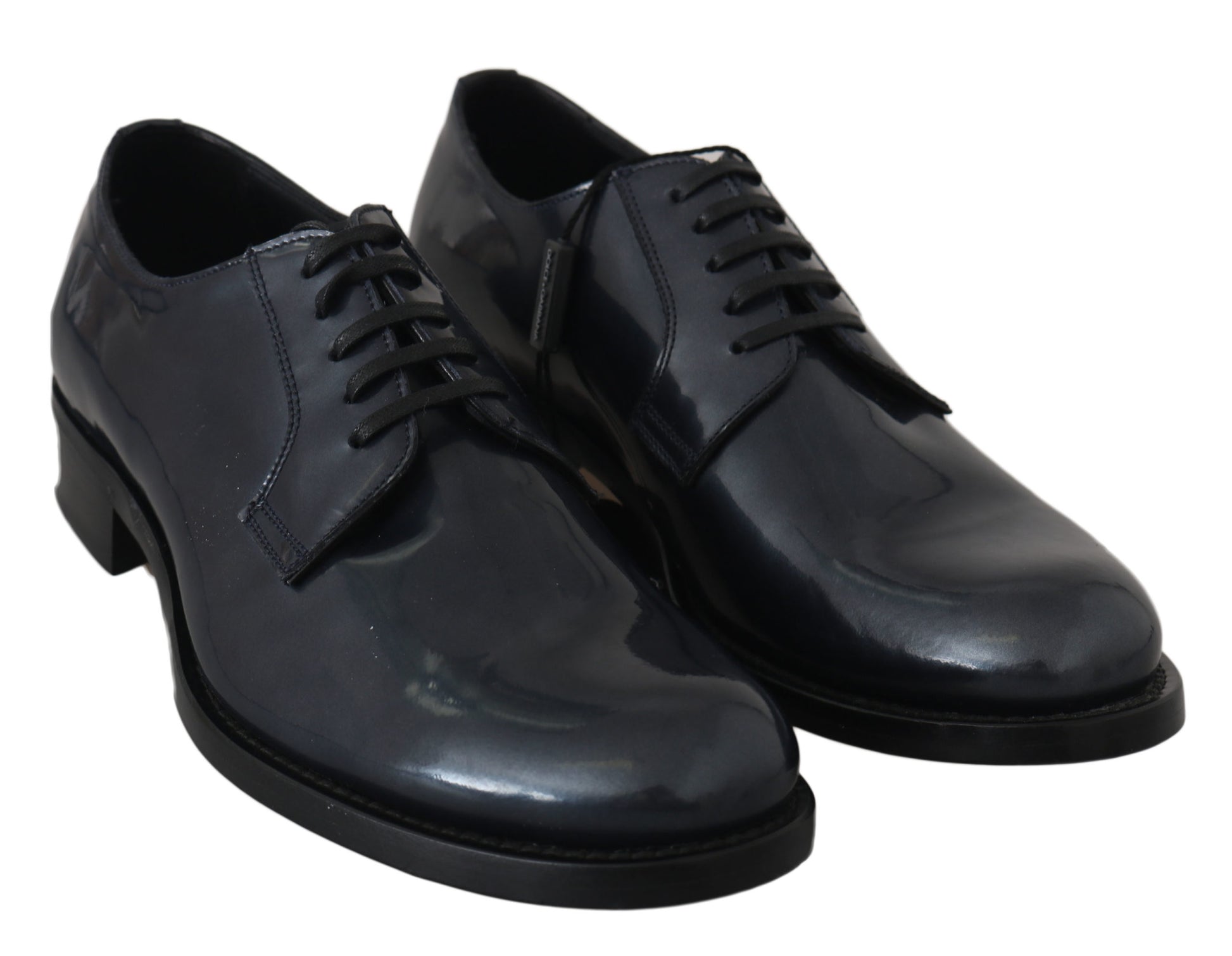 Pair of black leather dress shoes with laces and a shiny finish