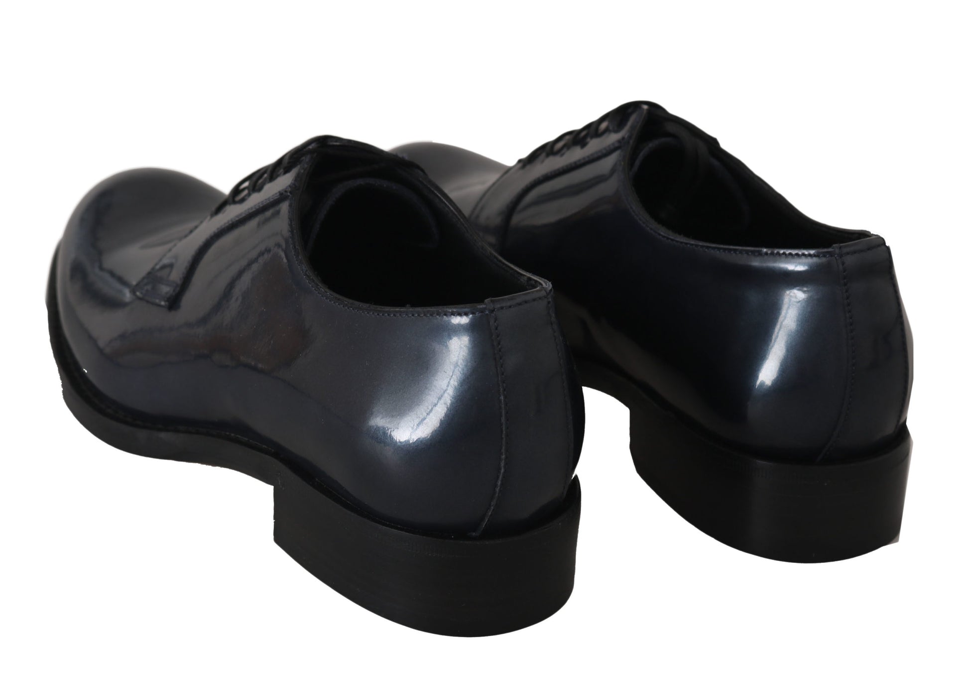 Pair of black dress shoes with laces and a shiny finish