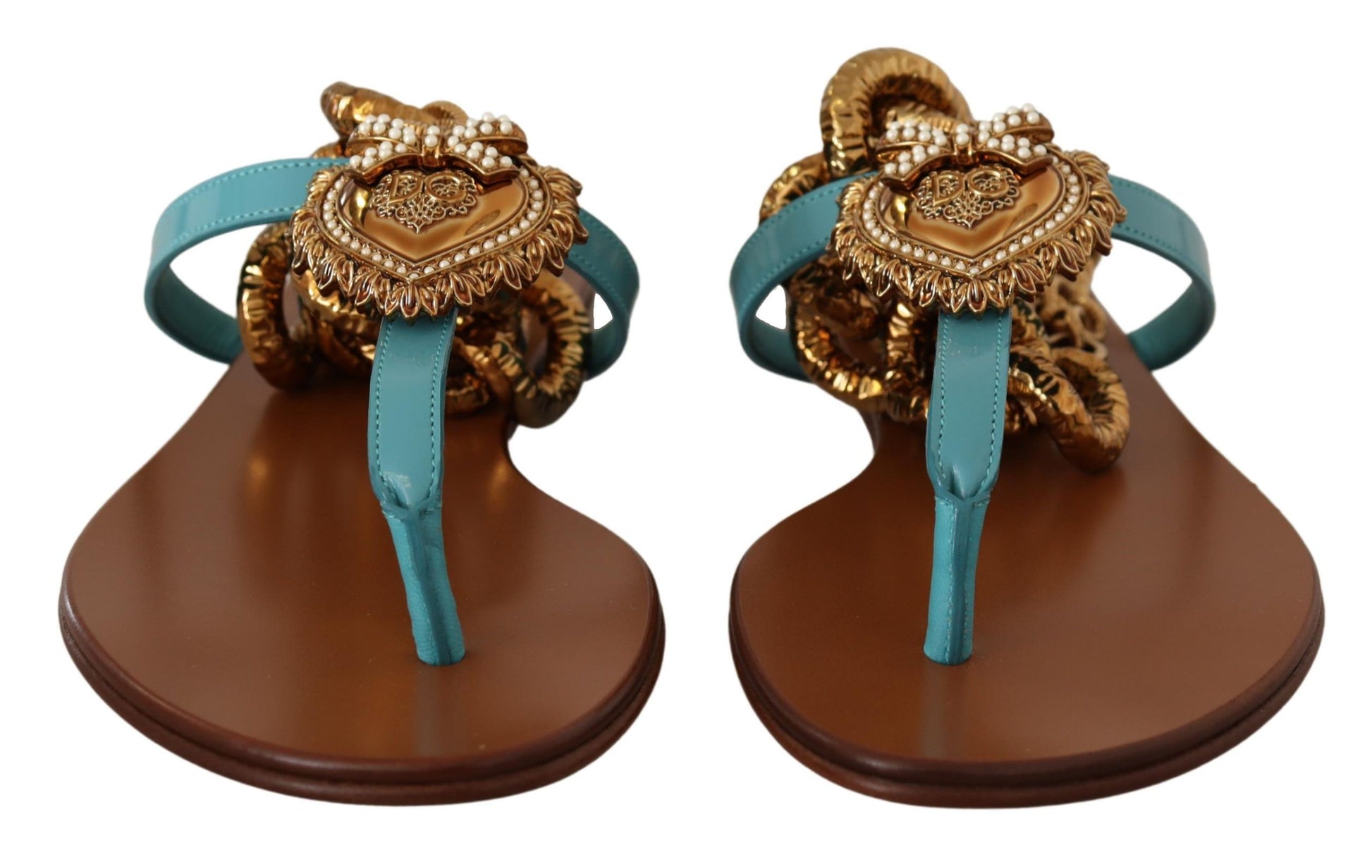 Pair of brown sandals with blue straps and gold embellishments
