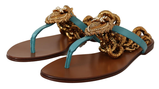 Pair of women's sandals with gold and blue embellishments