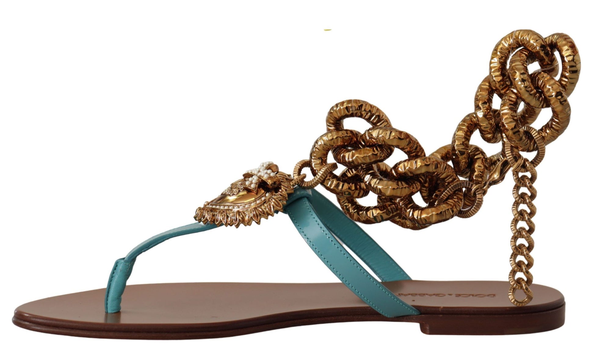 Gold and blue sandals with intricate chain designs on straps