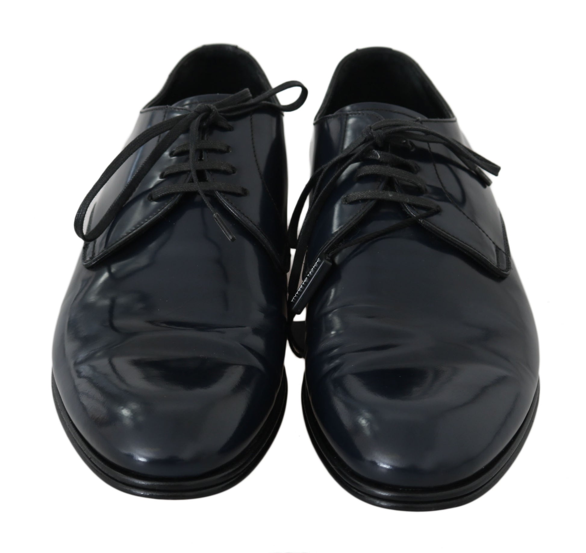 Pair of black leather dress shoes with laces and a shiny finish