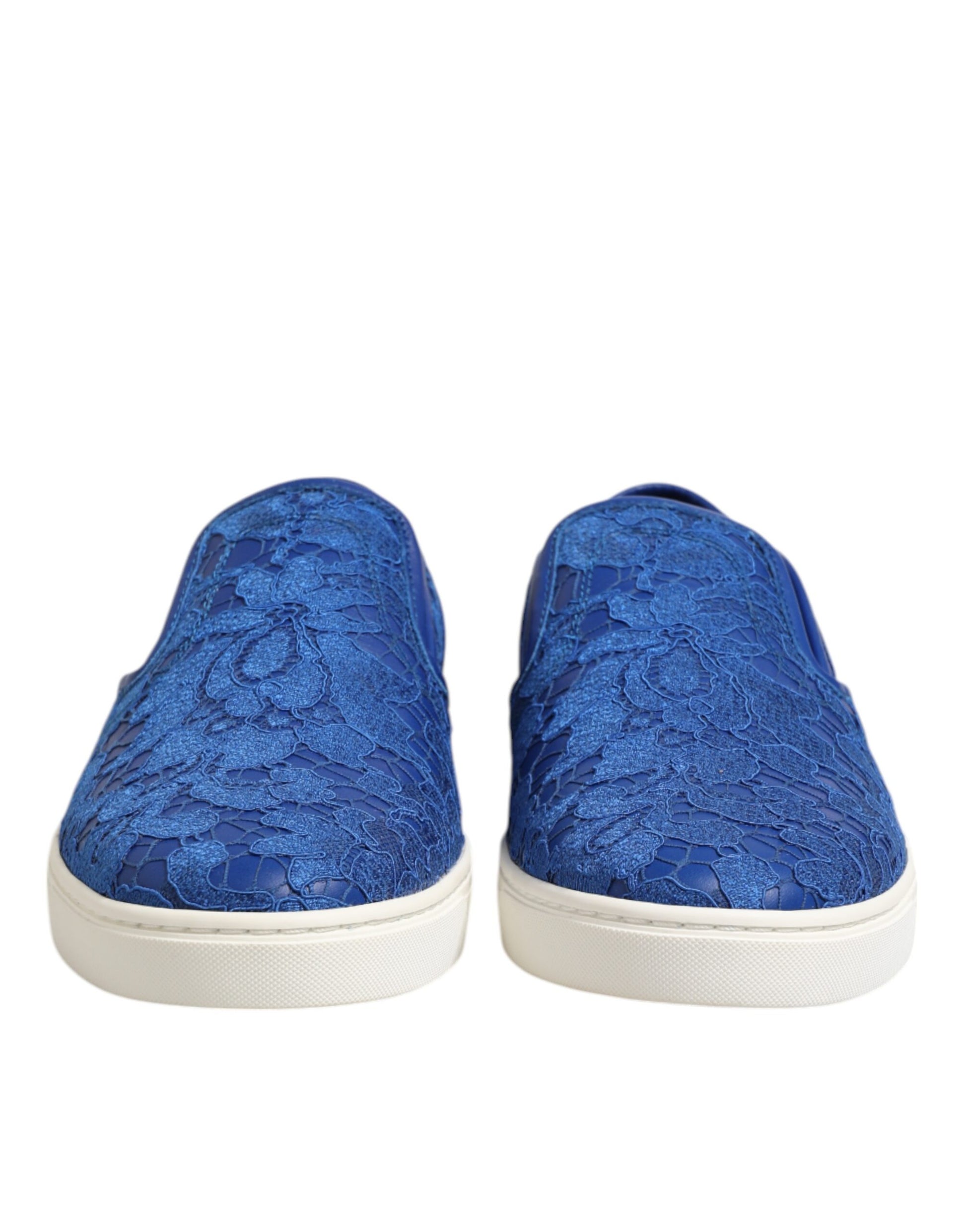 Pair of blue leather lace slip on shoes with floral pattern detail