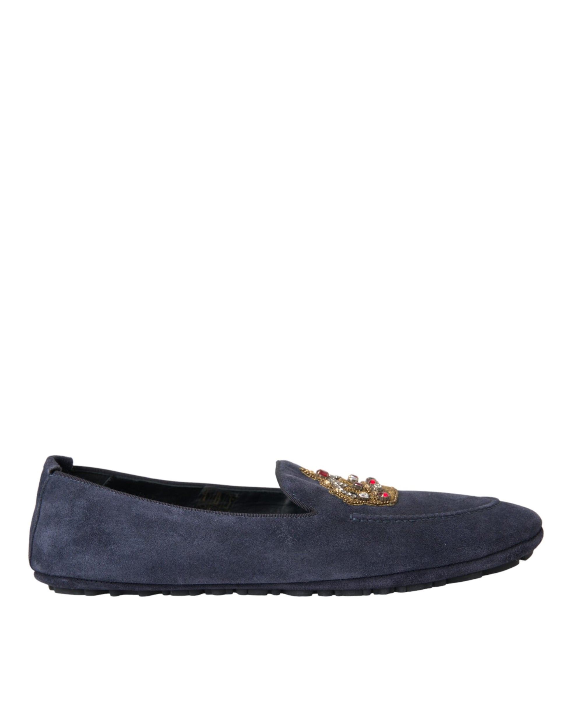 Pair of blue loafers with gold accents