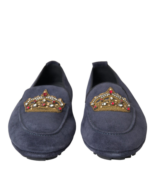 Pair of blue velvet loafers with embroidered crown design