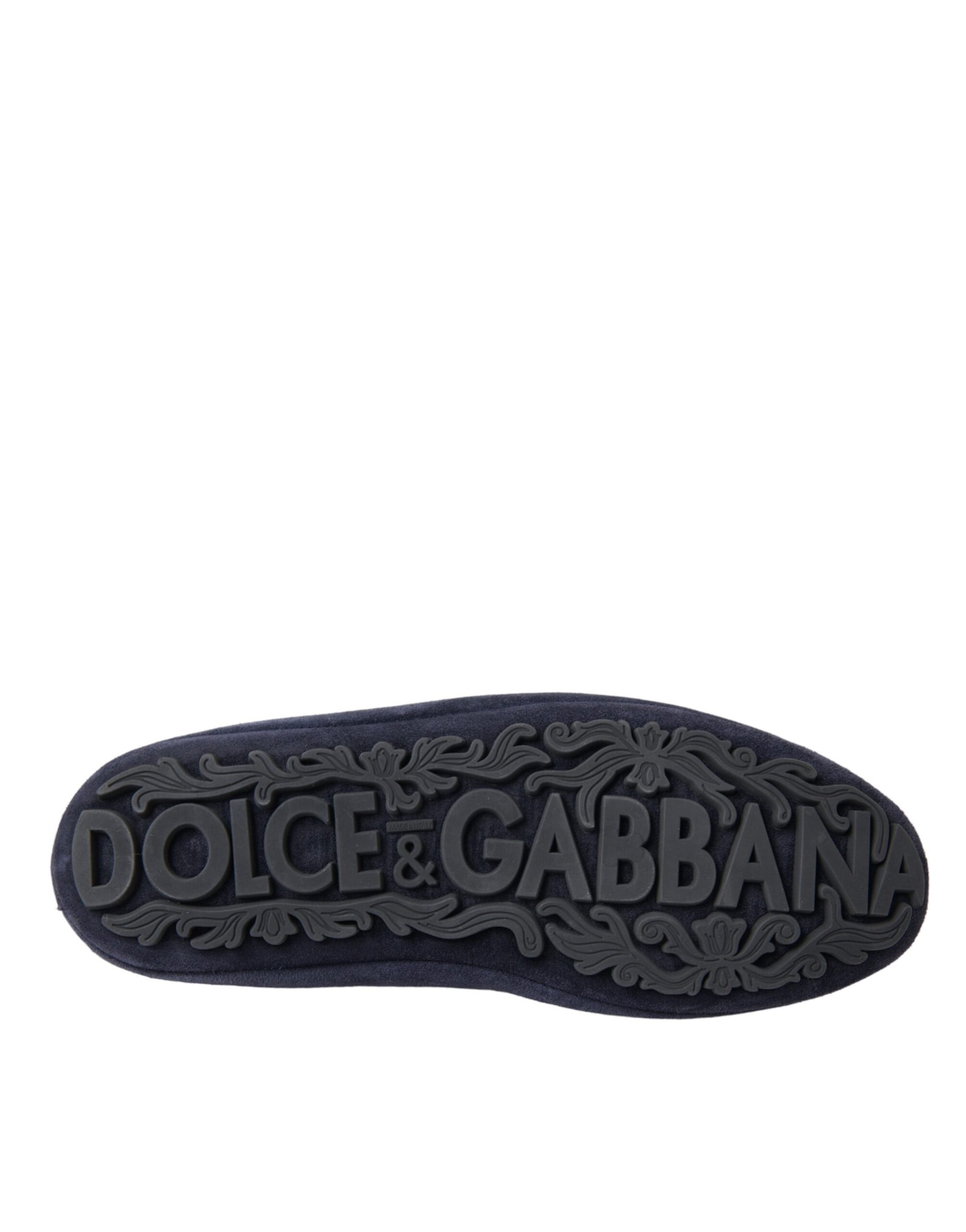 Shoe sole with brand name embossed in gold lettering