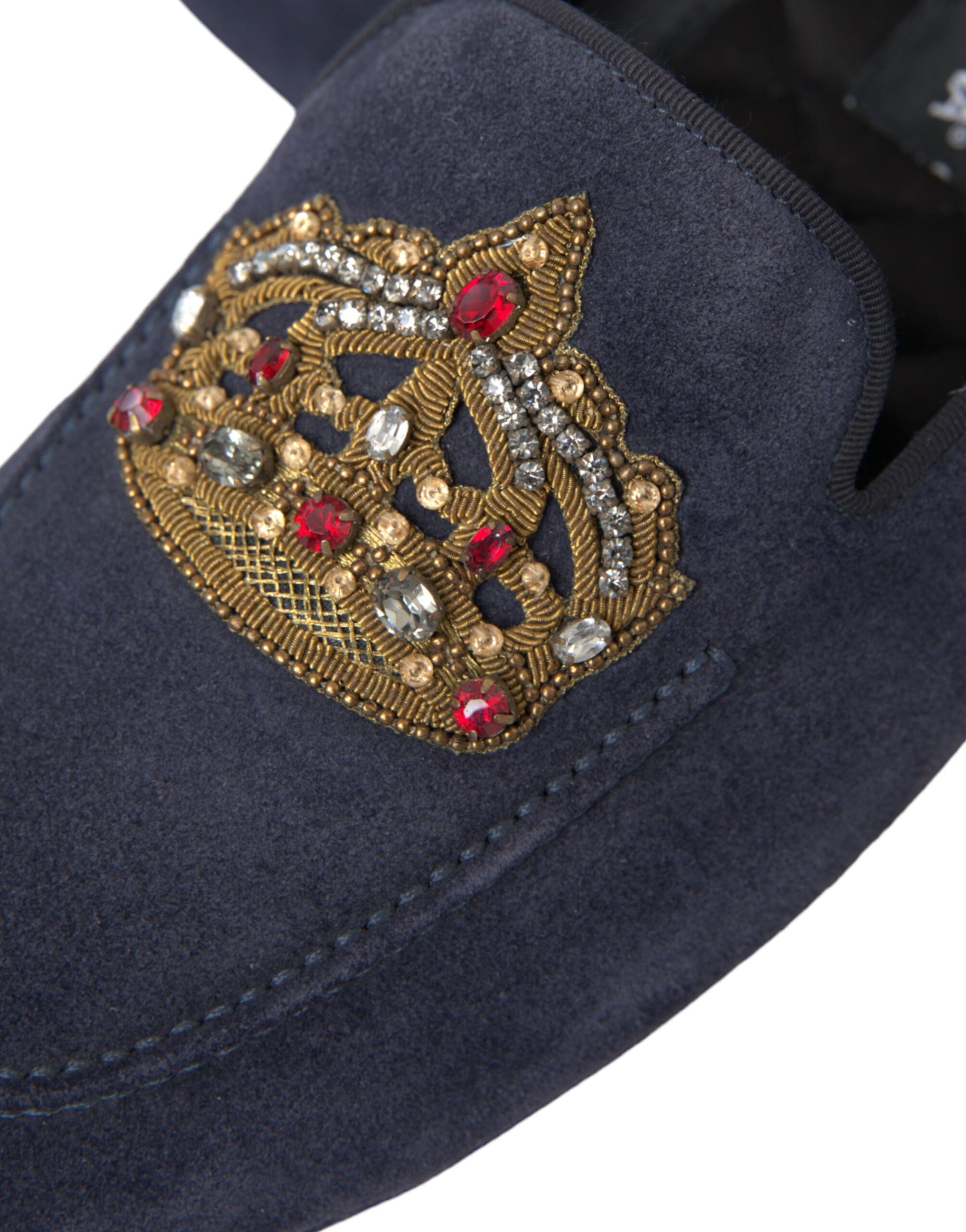 Blue shoe with embroidered crown on top