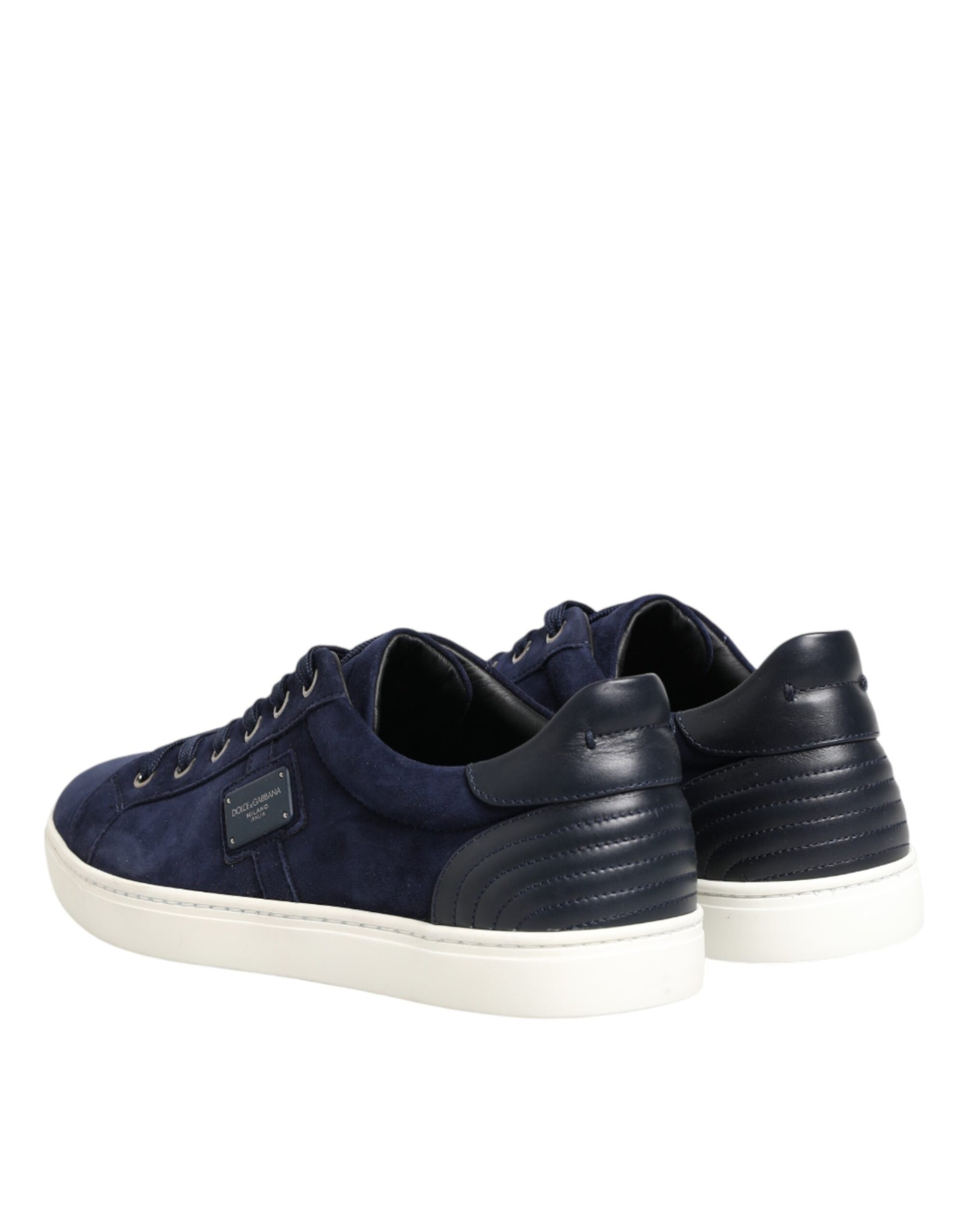 Pair of blue sneakers with white soles