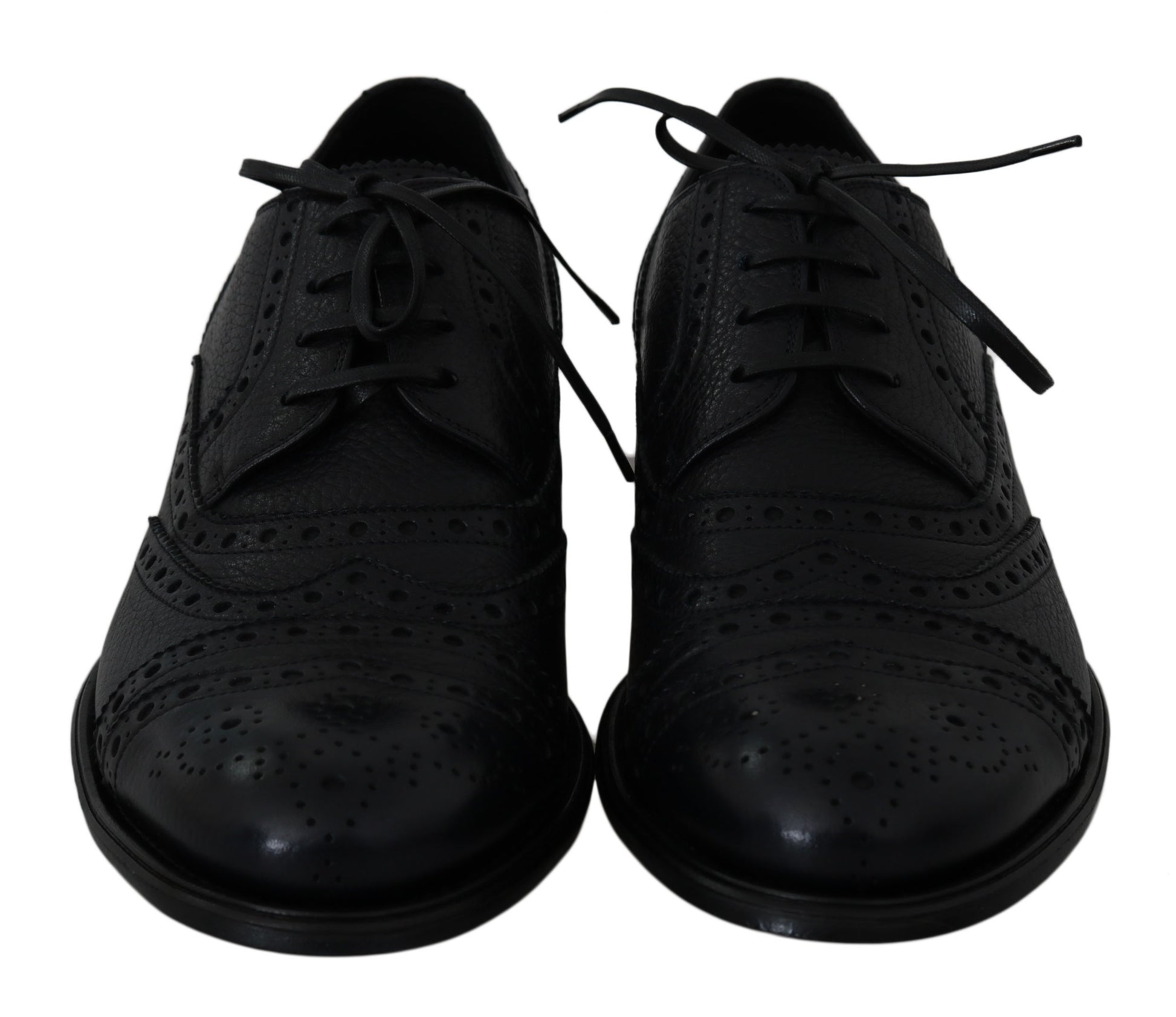Pair of black dress shoes with laces and a bow tie