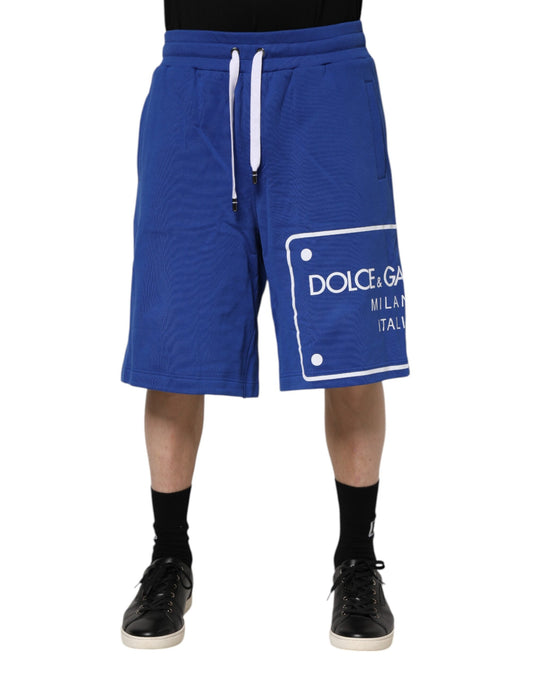 Blue shorts with white logo on side