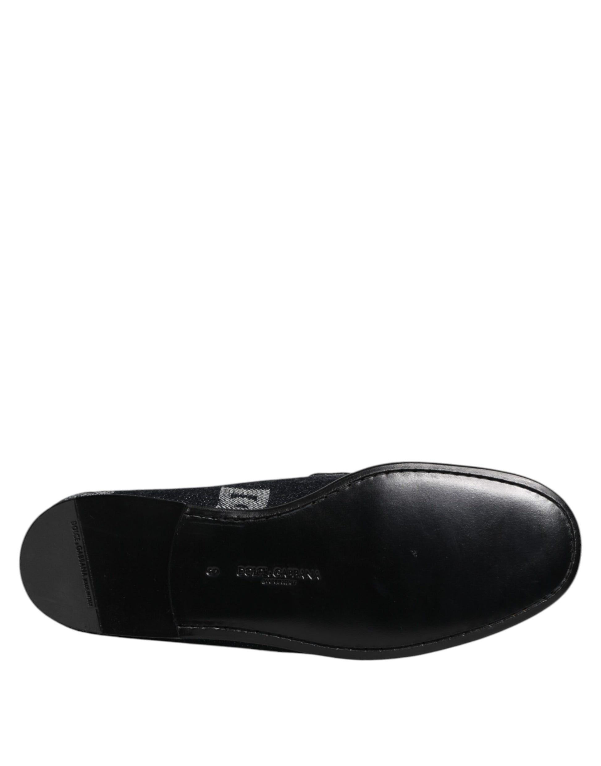 Black loafer with blue logo on side