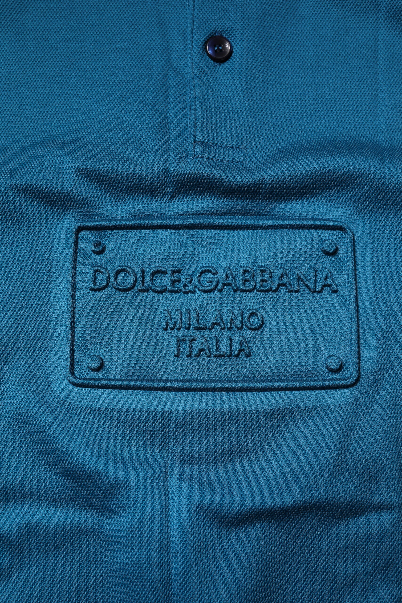 Blue denim jacket with brand label on front