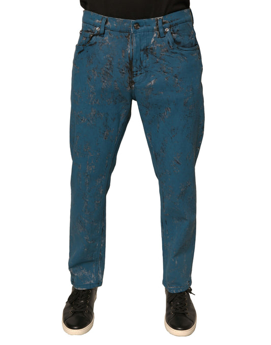Blue denim jeans with distressed design