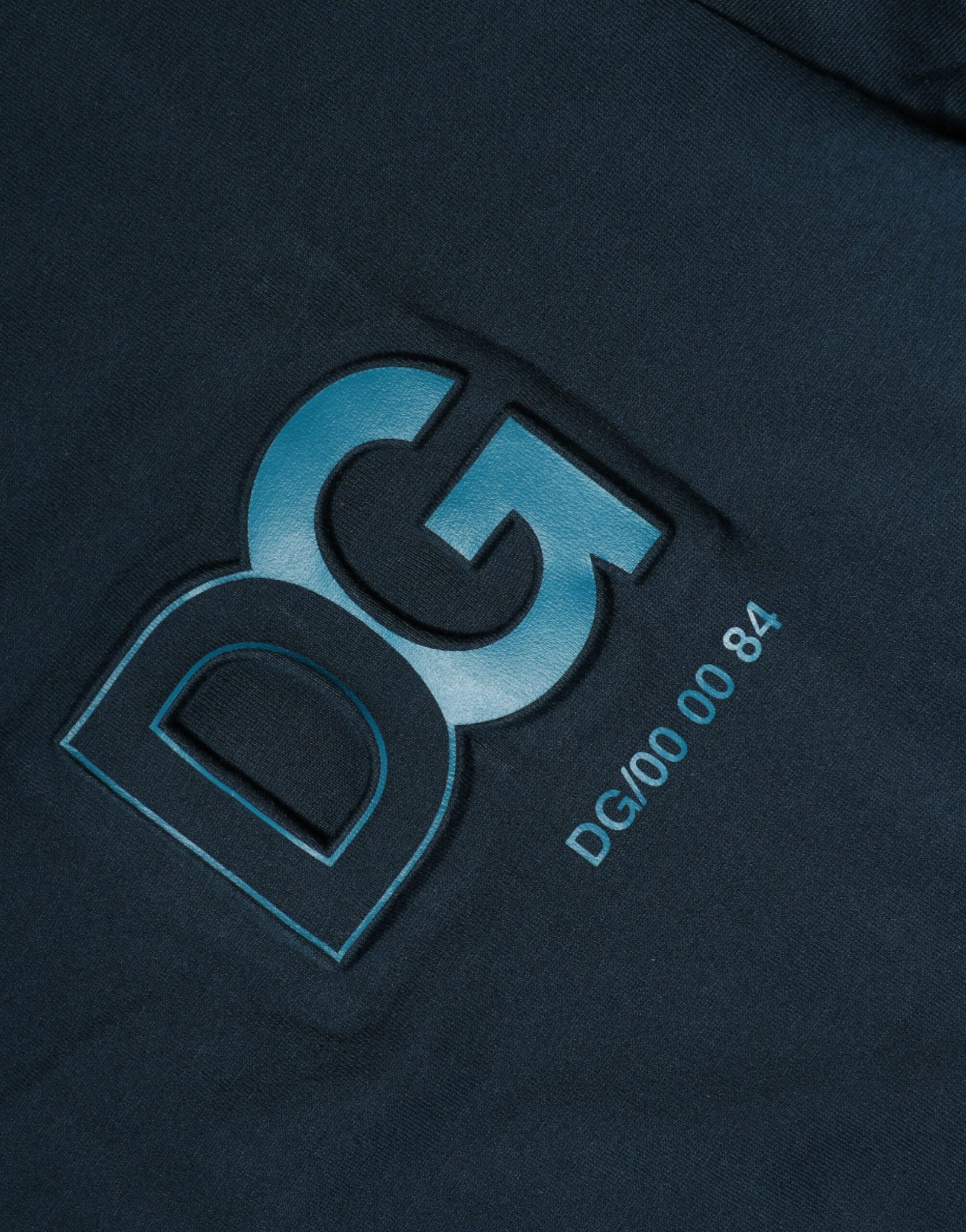 The logo on a dark fabric background