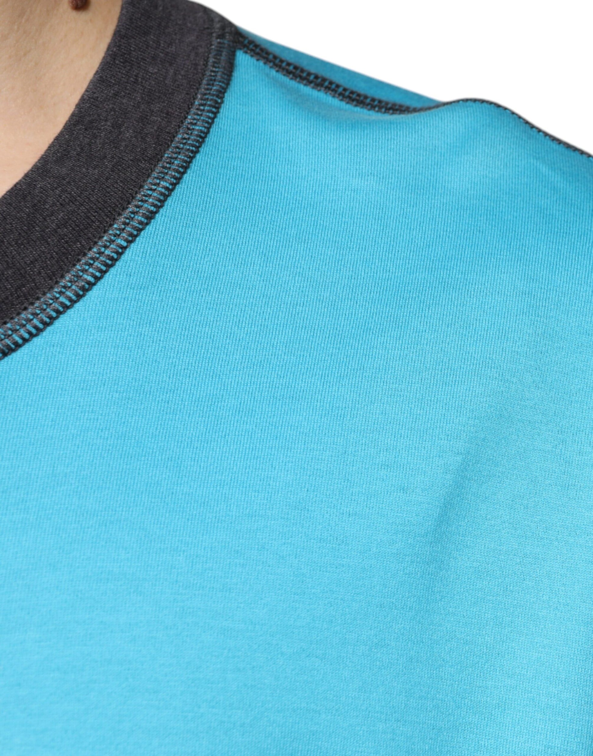 Blue sleeveless shirt with black trim