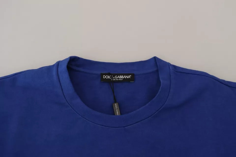 A blue crew neck t-shirt with a logo print on the front