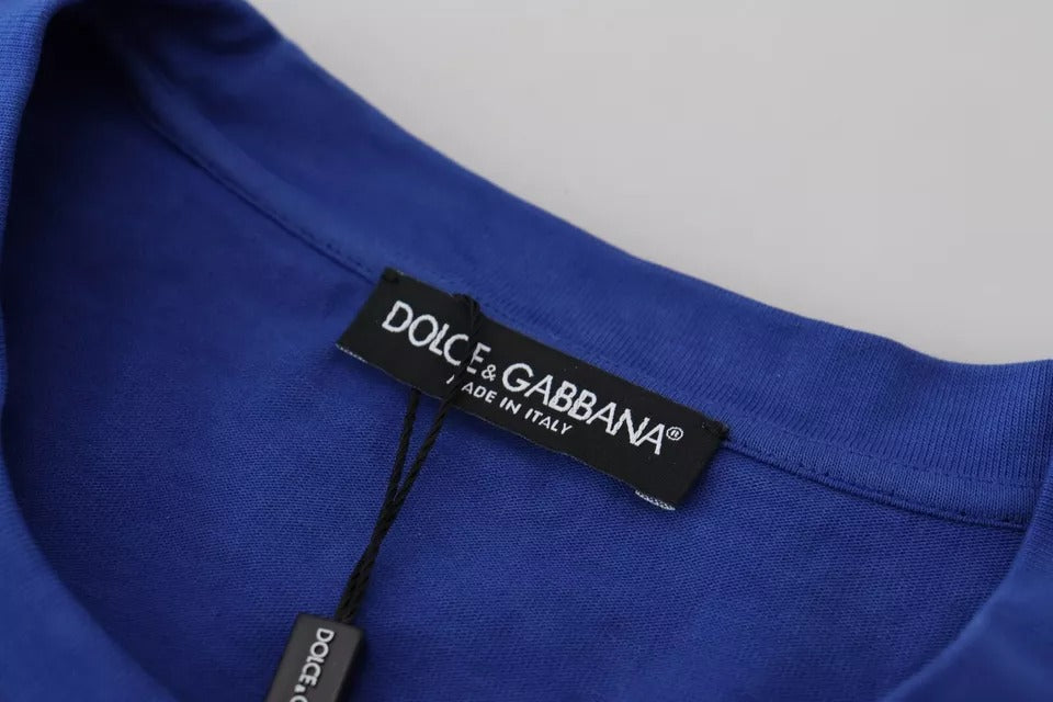 A blue crew neck t-shirt with a logo print on the front