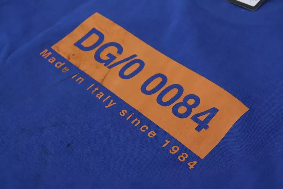 A blue crewneck t-shirt with a logo print on the front