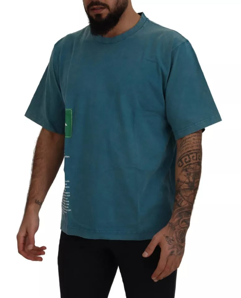 Man wearing blue t-shirt with graphic design on front