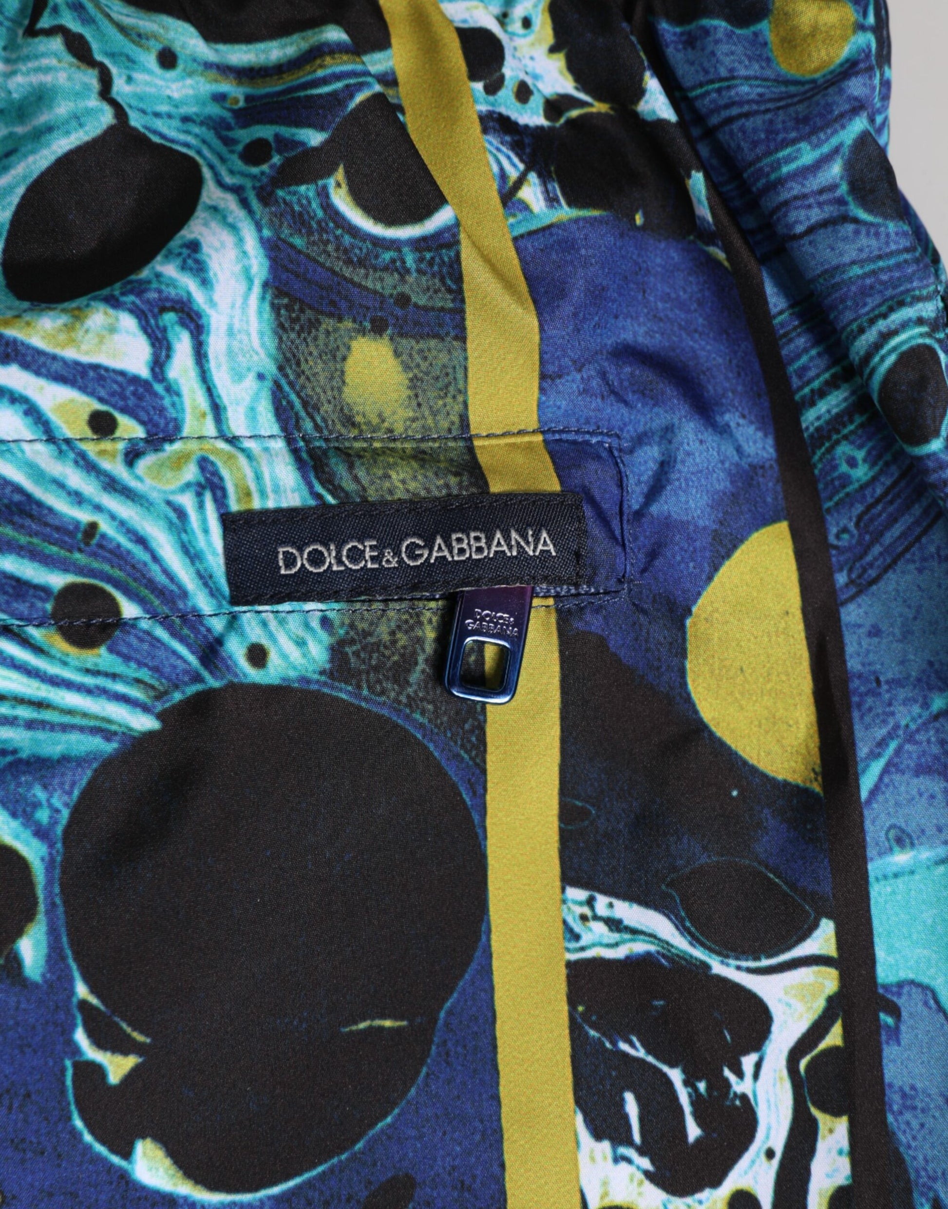 Blue scarf with yellow stripe on end