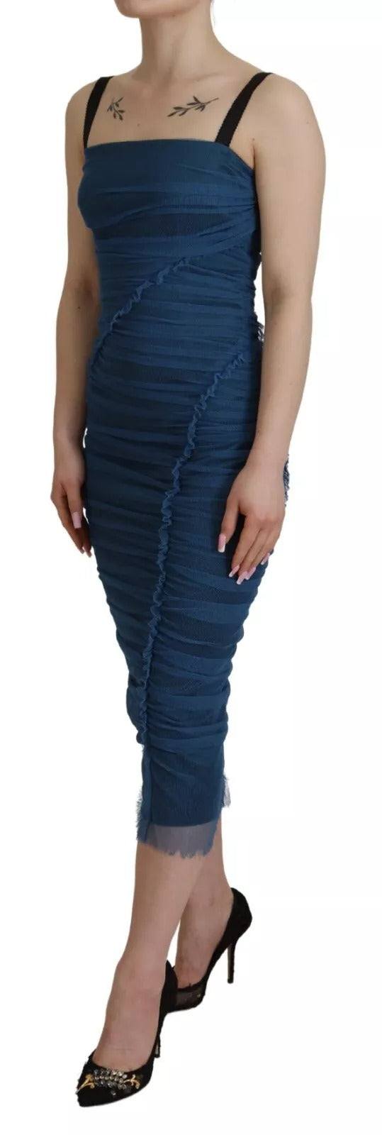 A blue dress with mesh trim and ruched tulle detailing