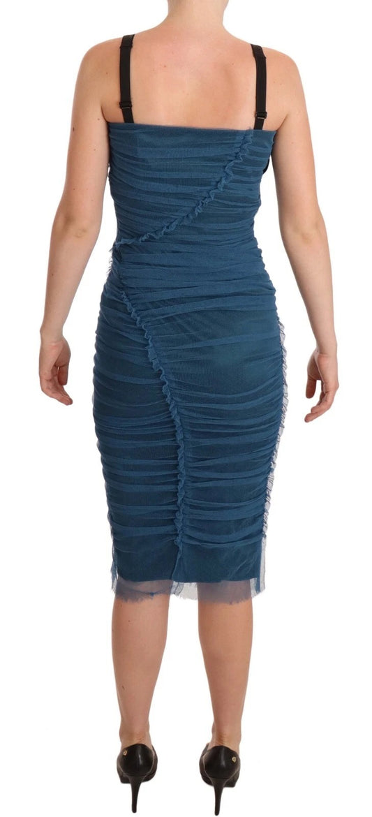 A blue dress with mesh trim and ruched tulle detailing
