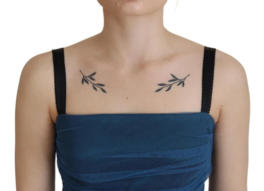 A blue mesh trim ruched tulle sheath dress with a black bra strap
