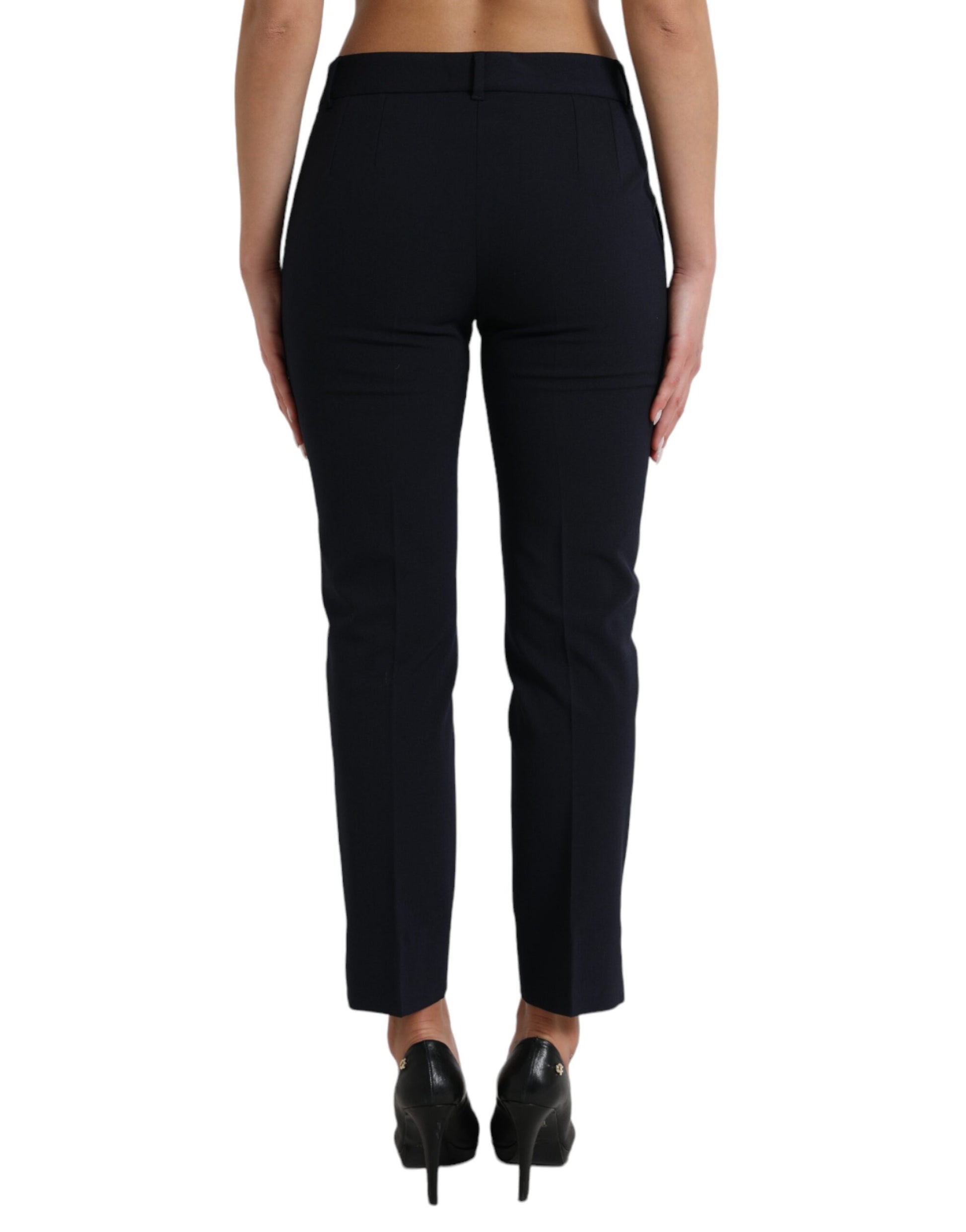 Pair of dark blue trousers on a mannequin