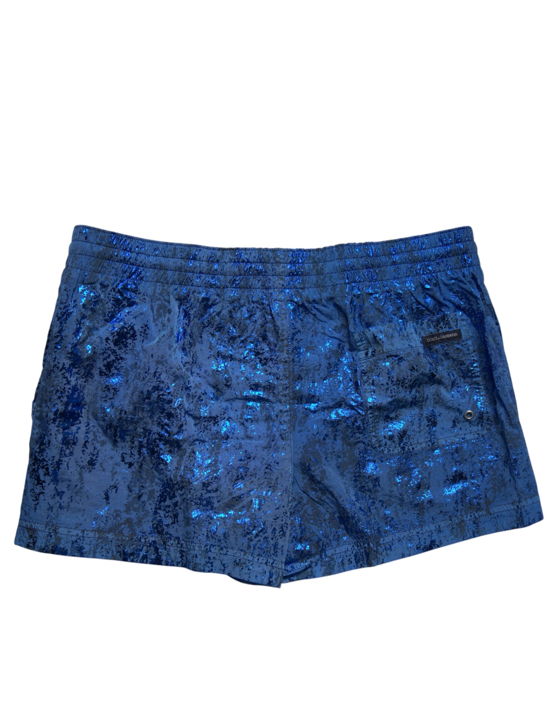 A pair of blue nylon beachwear swim shorts with a glittery texture