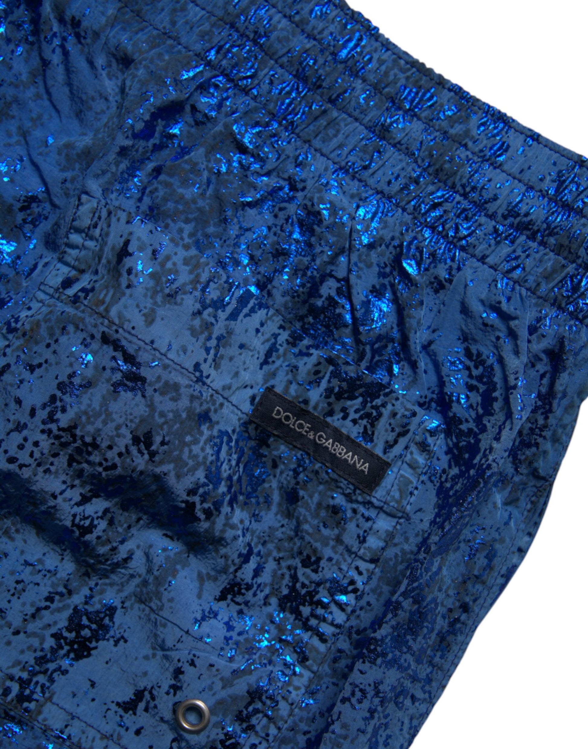 Blue nylon beachwear swim shorts with brand label