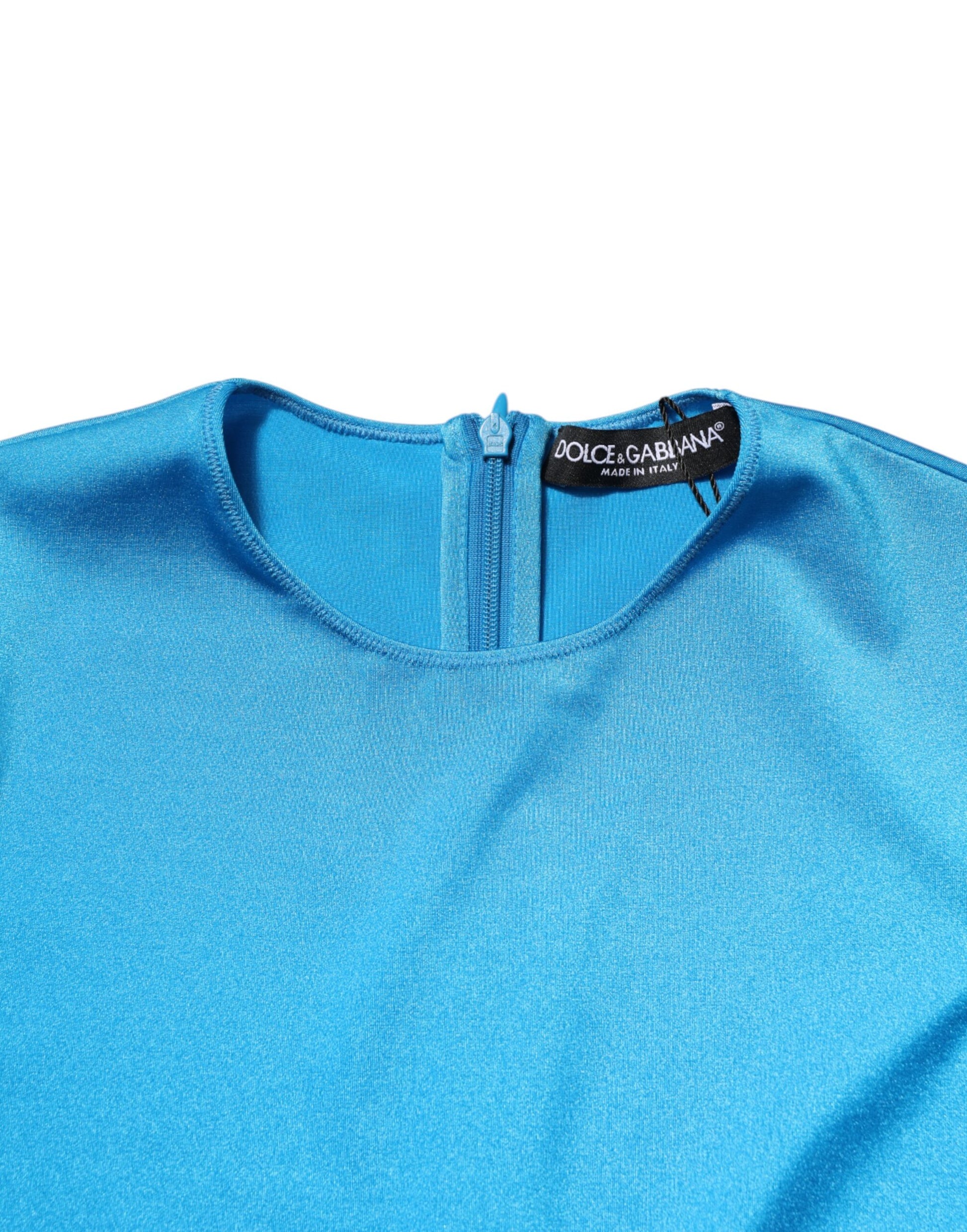 A blue nylon jumpsuit with a crew neck and body-hugging fit