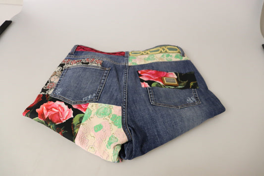 Pair of denim shorts with floral pattern on front