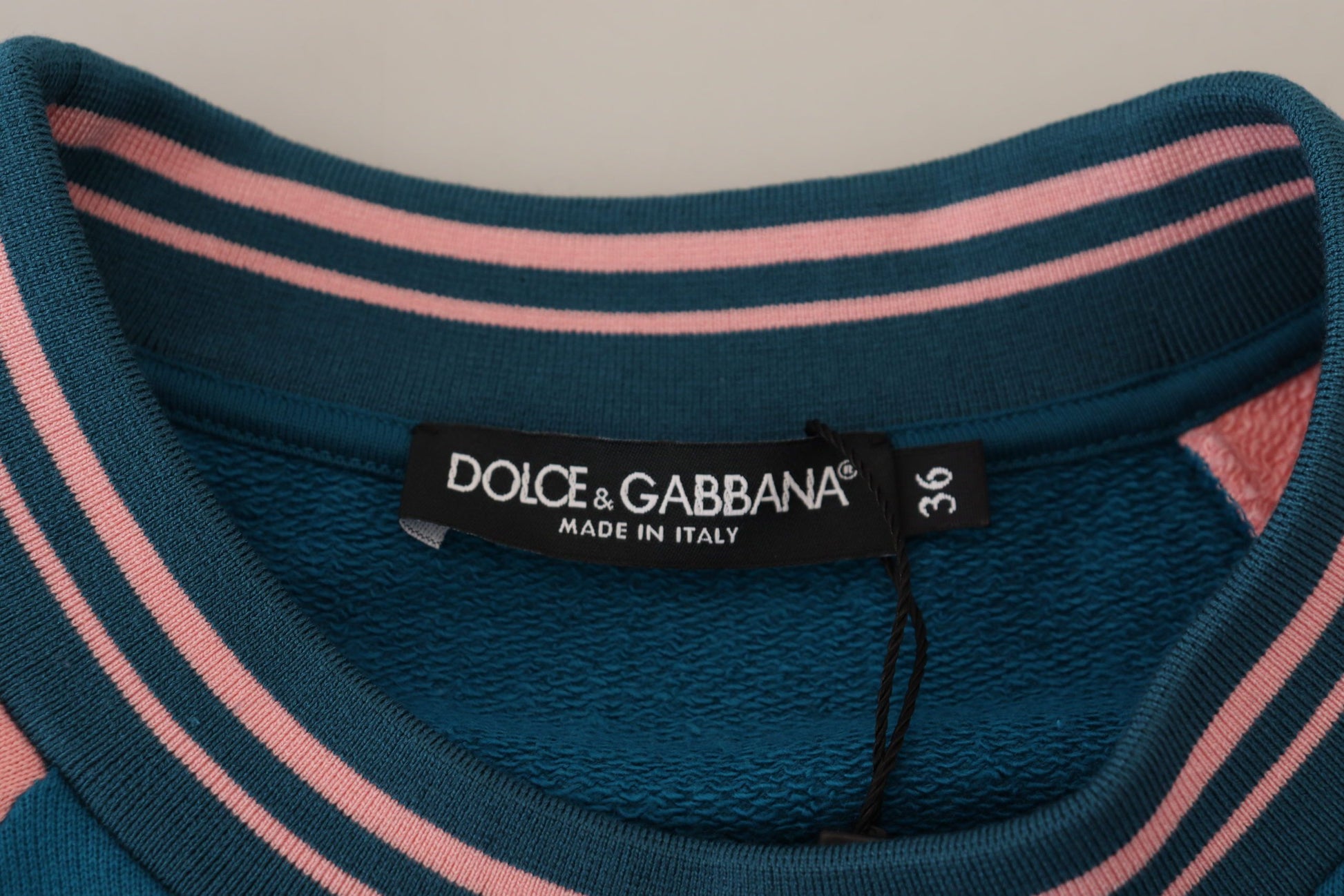 Blue sportswear with pink stripes