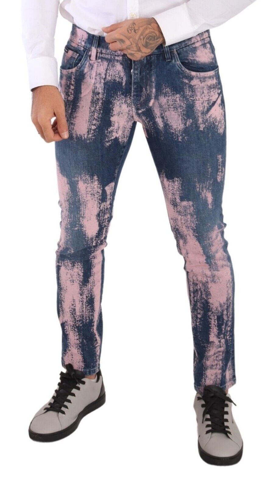 Man wearing blue jeans with pink design