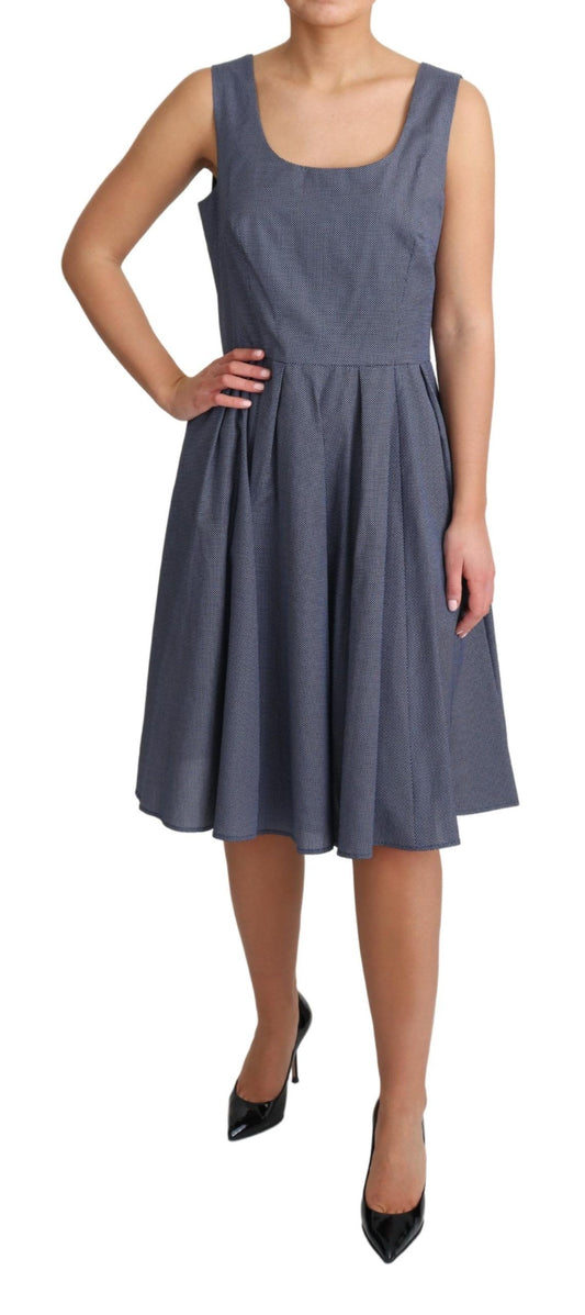 A blue polka dot dress with a stretchy waistband and an A-line skirt