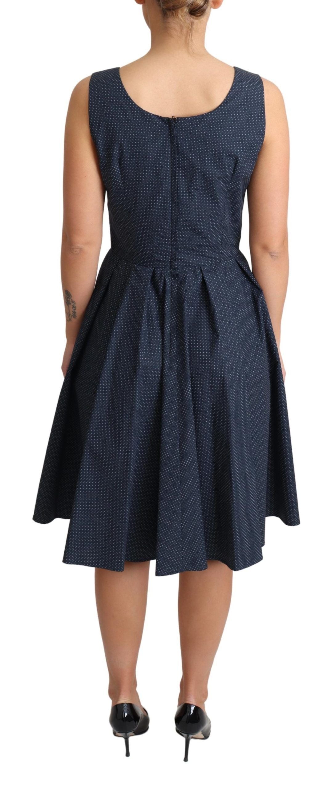 A-line dress with polka dots, blue color, cotton fabric, sleeveless design