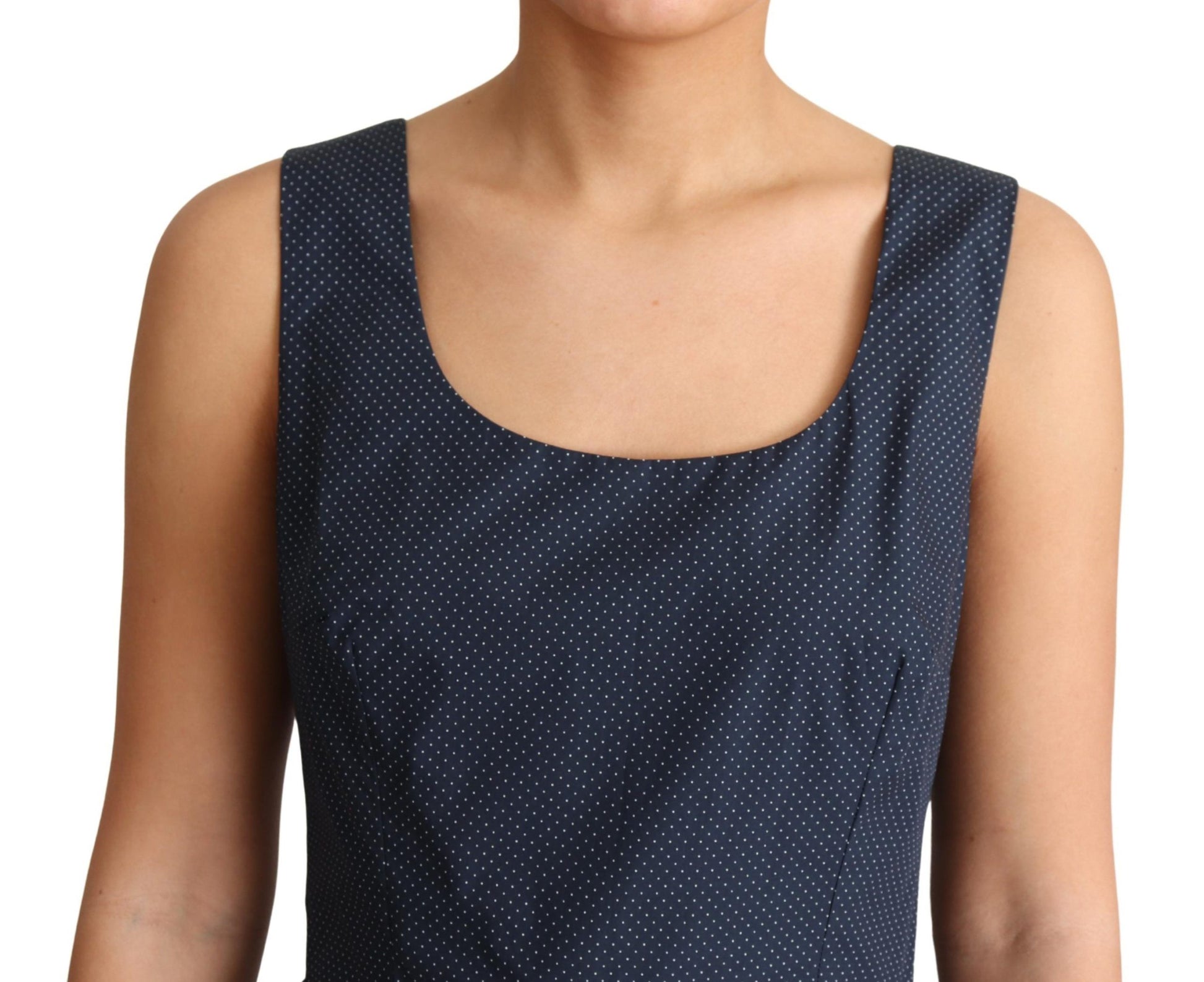Navy blue polka dotted cotton dress with short sleeves and a-line silhouette