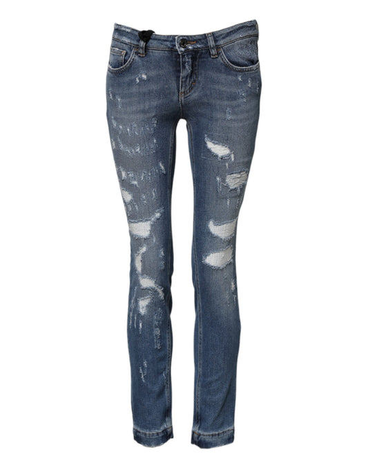 Pair of blue denim jeans with distressed details