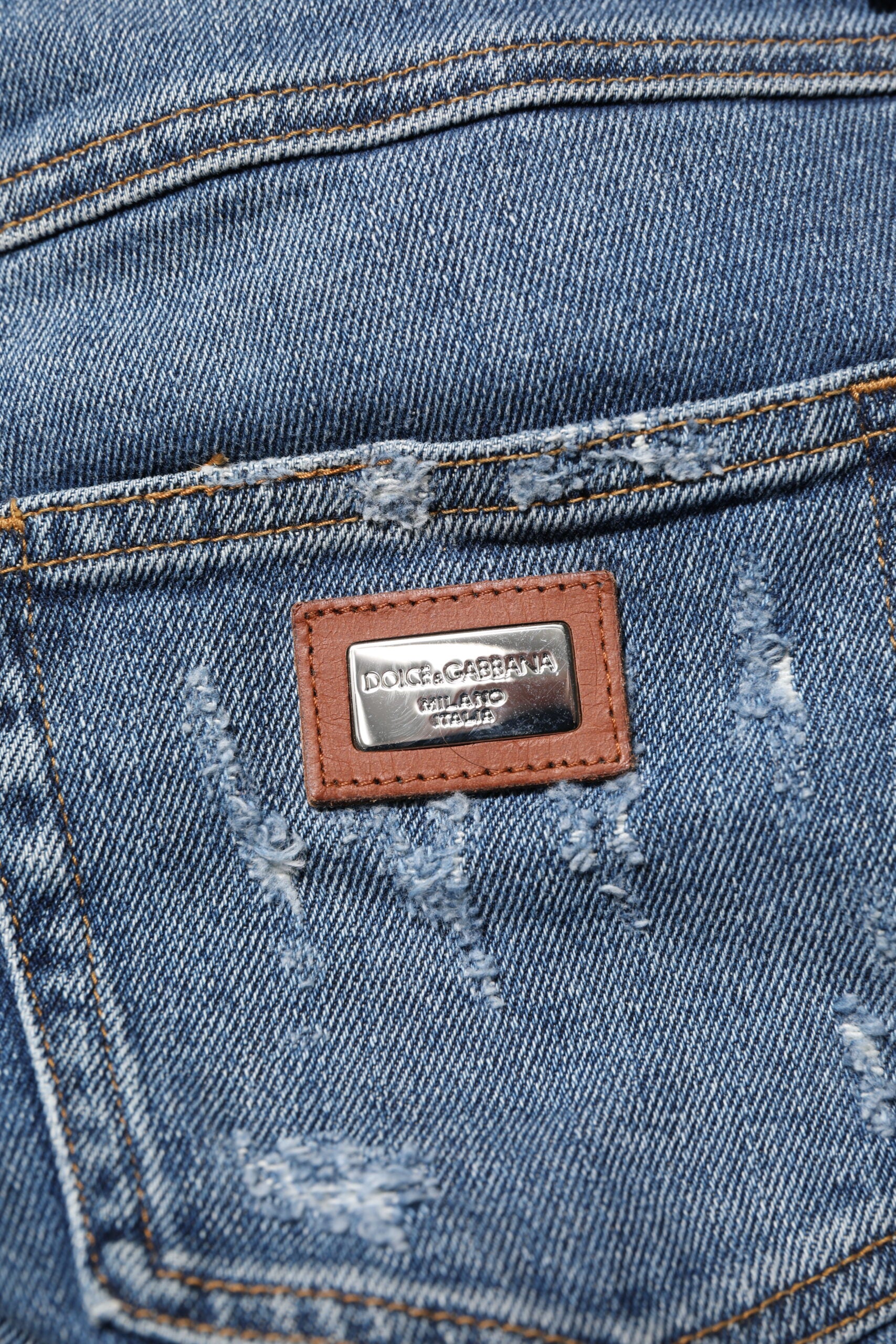 Blue denim jeans pocket with brand label