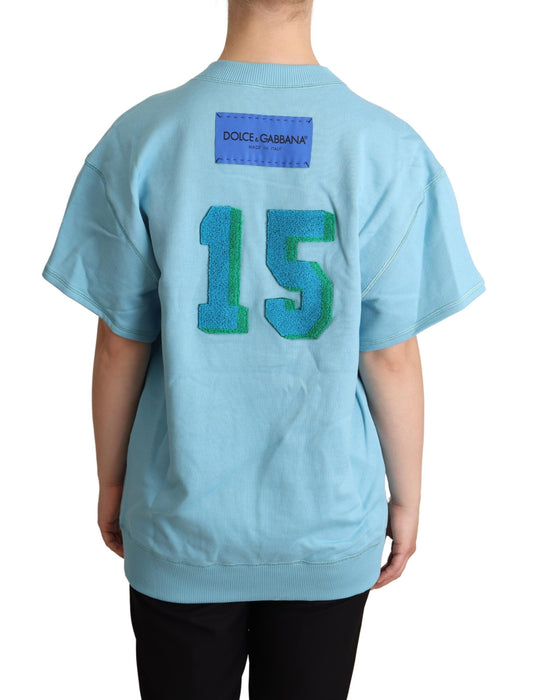 Blue shirt with number 15 on back